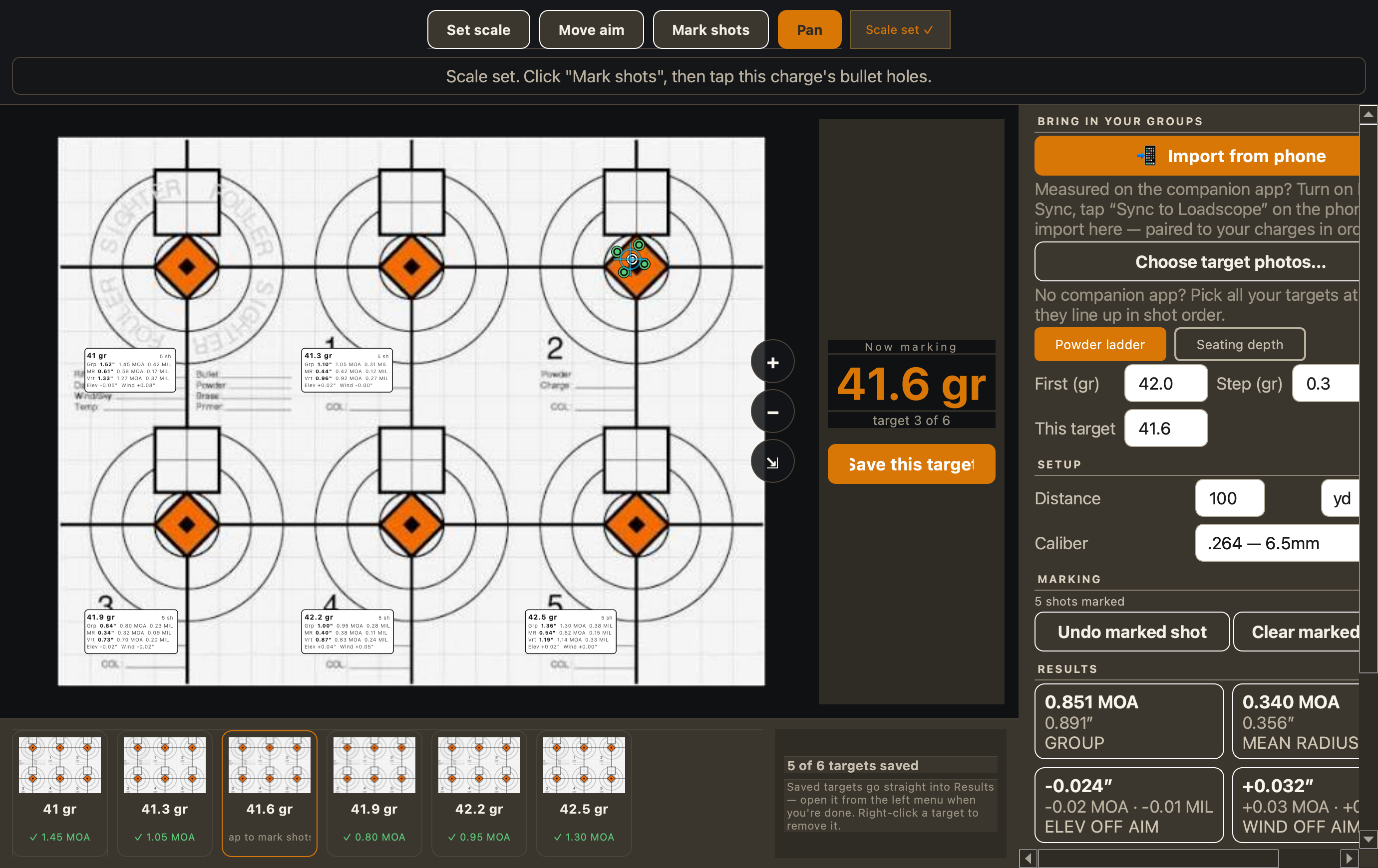 Loadscope Measure Target screen: a 6.5 Creedmoor powder ladder measured on one six-bull target sheet, each bull tagged with its powder charge and group in MOA, an Import from phone button and a Powder/Seating ladder toggle on the right, and live Results showing group size and mean radius for the charge being marked.